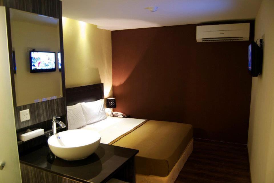 Zotel Business & Leisure Hotel กูชิง ห้อง รูปภาพ